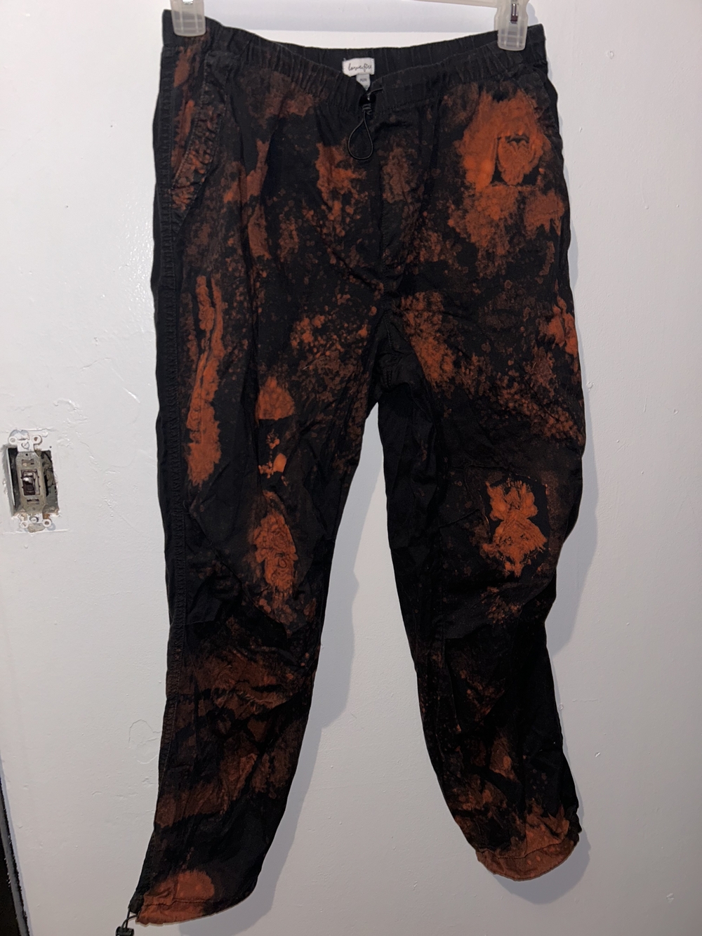love, Fire Black Joggers with Orange Tie-Dye Accents